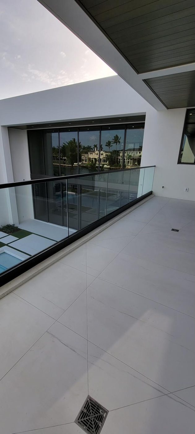 Staircase with frameless glass railing